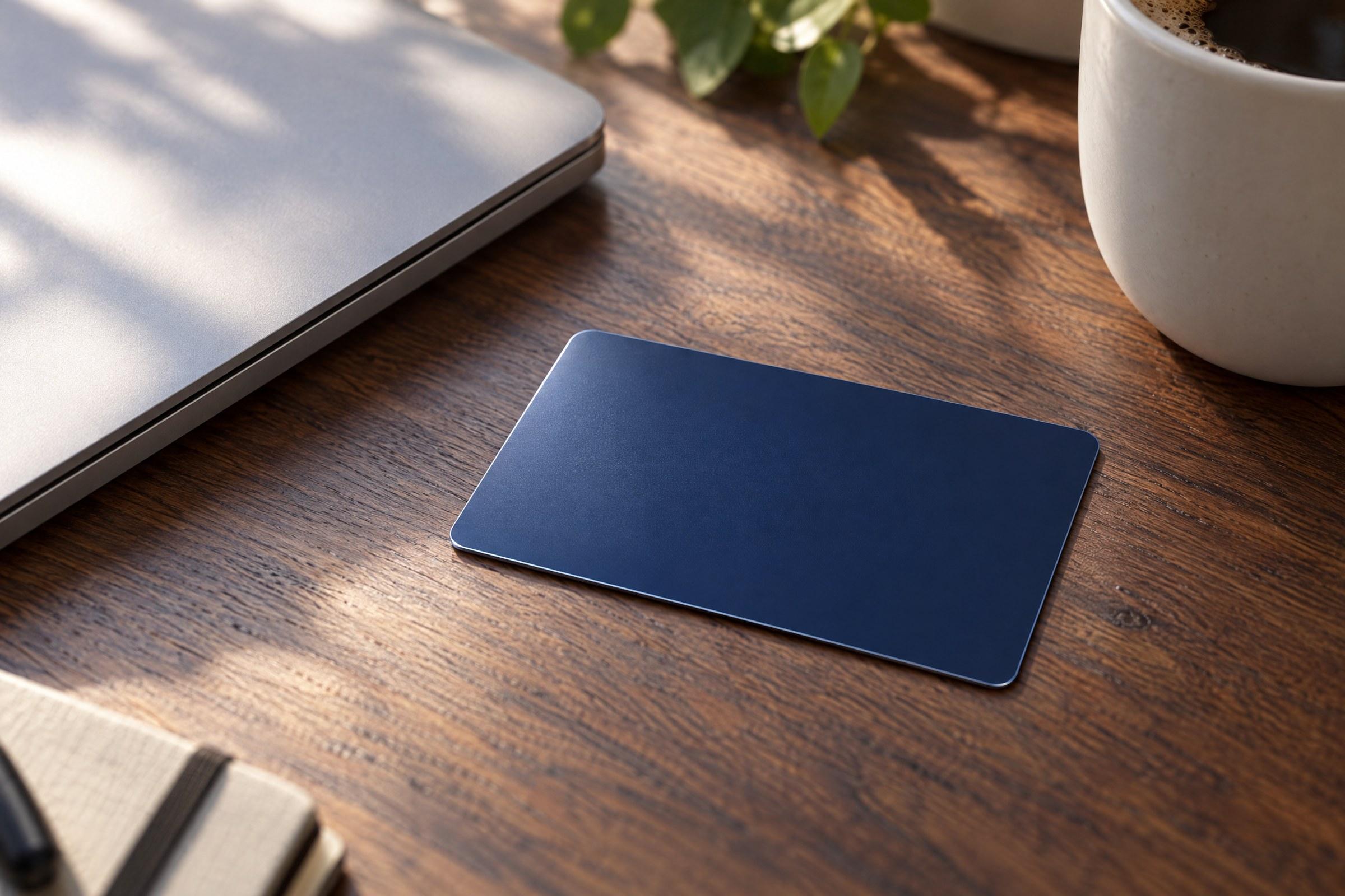 A NOVARA card resting on a walnut desk in morning light